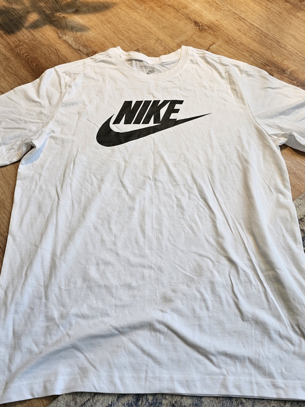 Nike White Short Sleeve Tee with Black Swoosh Logo